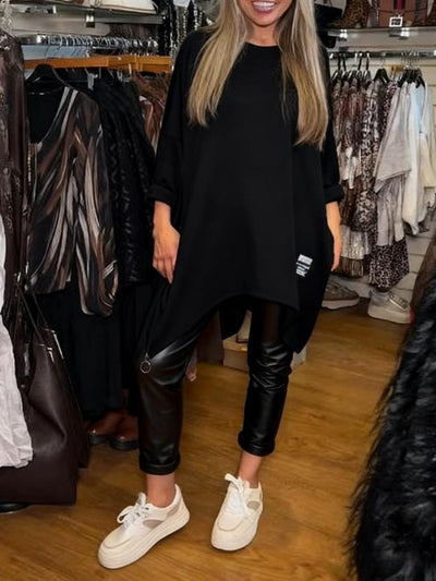 Haut ample asymétrique et pantalon uni, ensemble deux pièces