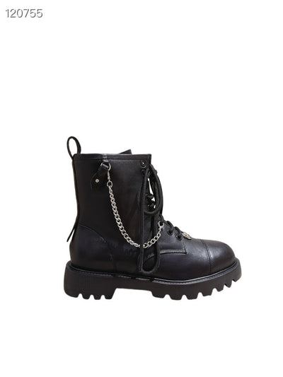 La Botte Velours Signée : Le Motif Iconique au Service du Luxe Décontracté