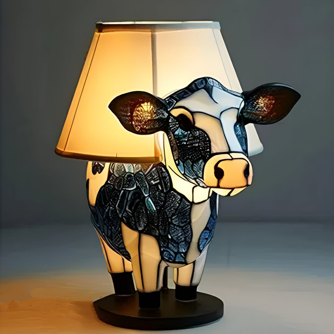 Clochette – Lampe vache magique en verre coloré